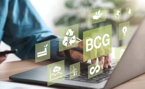 Businessman using computer to study BCG for sustainable economic