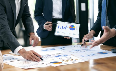 diverse coworkers working together in boardroom, brainstorming,