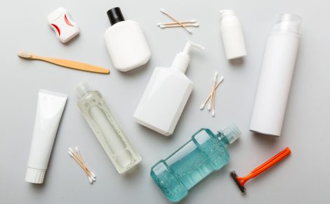 mockup for bathing products top view flat lay, spa razor, toothpaste, soap, gel and other various accessories. cosmetics for skin health. bath mockup for your logo